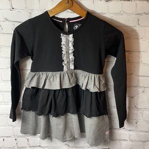 Ruffle Butts black contrast ruffle top
